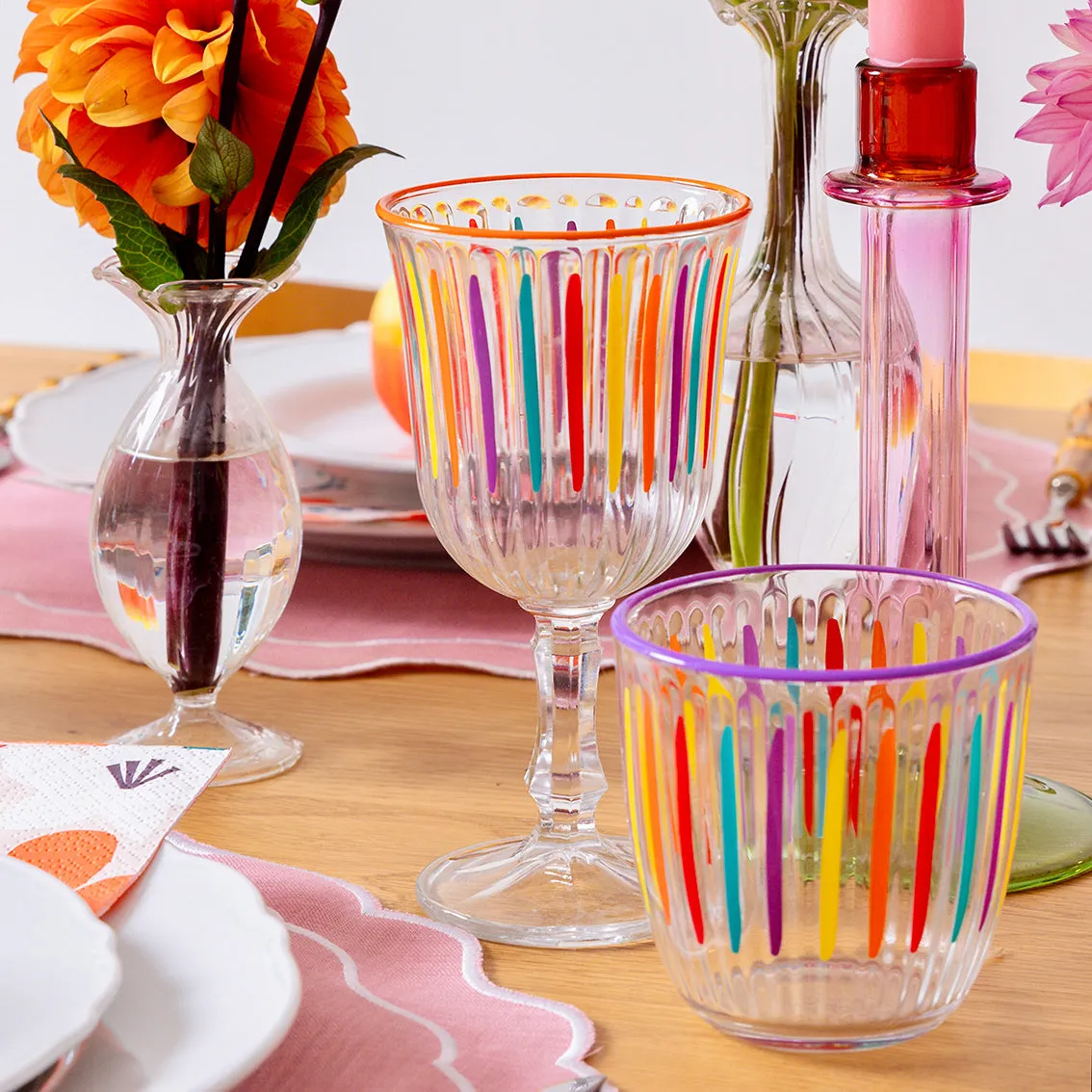 Bright striped multi coloured wine glass