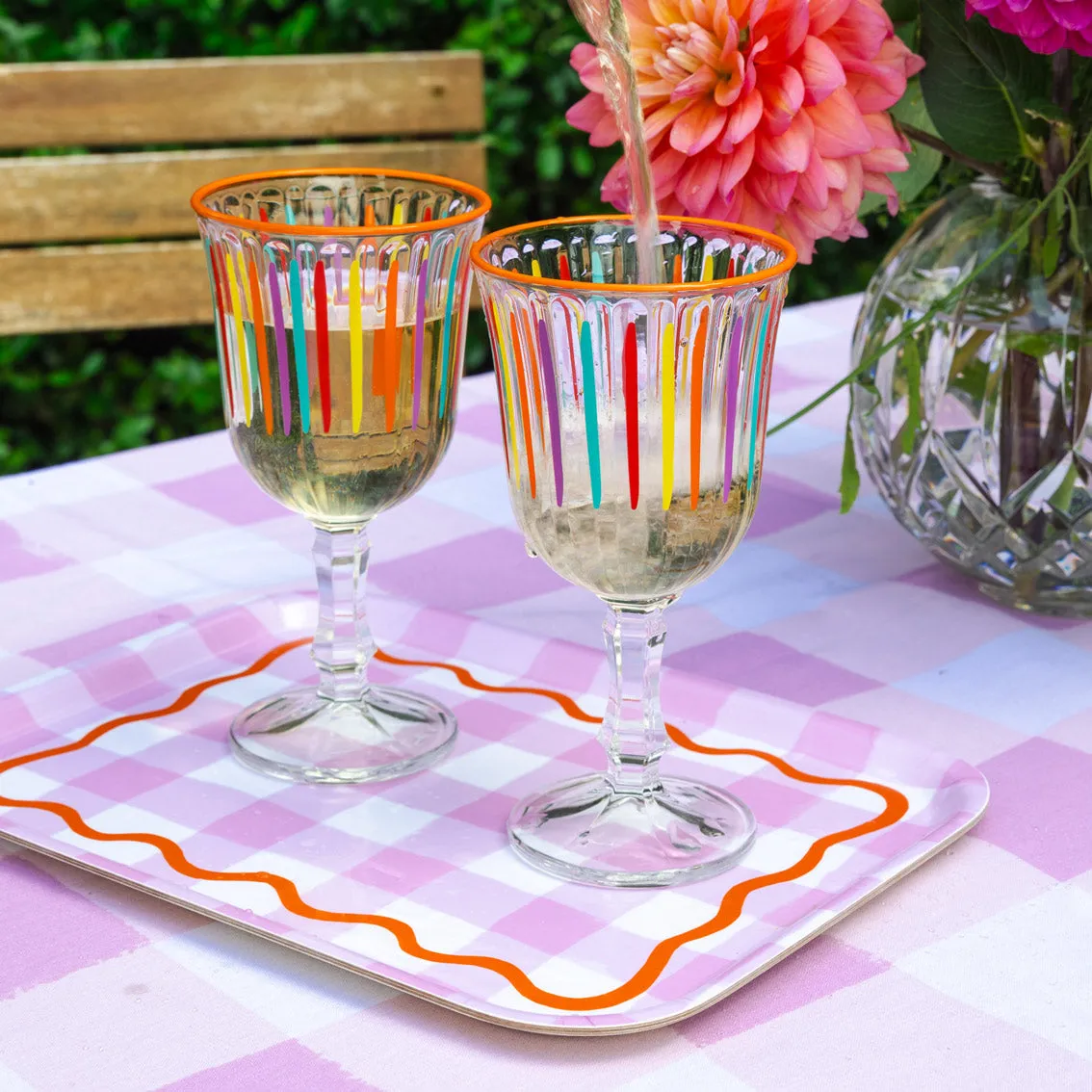 Bright striped multi coloured wine glass