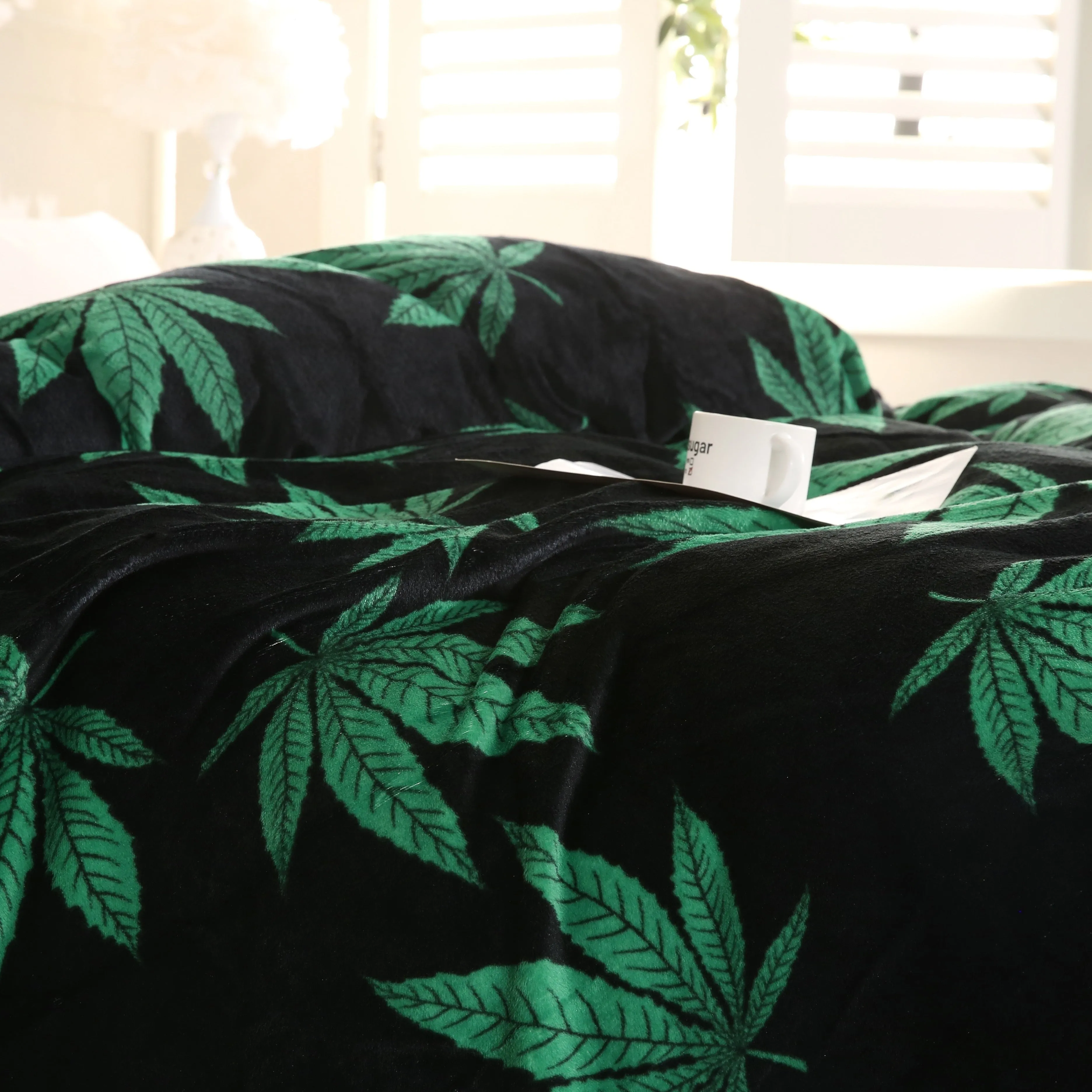 Soft and cozy leaf print flannel blanket for couch and bed